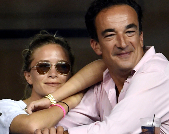 Olivier Sarkozy and Mary-Kate Olsen are seen watching Victoria Azaranka defeat Alexandrk Kurnic on day eight of the 2014 US Open at the USTA Billie Jean King National Tennis Center on September 1, 2014 in the Flushing neighborhood of the Queens borough of New York City.  Pictured: Olivier Sarkozy and Mary-Kate Olsen Ref: SPL833015  010914   Picture by: Splash News  Splash News and Pictures Los Angeles: 310-821-2666 New York: 212-619-2666 London: 870-934-2666 photodesk@splashnews.com 
